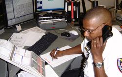 Man Speaking on Phone in Communication Division