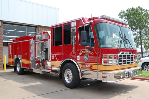 Large Fire Truck in Front of Station